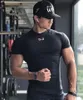 Brand krótki Sudy Suszący Ubrania sportowe męskie ubrania na siłownię ciasny trening koszykówki fitness noś T-shirt Wholle202F