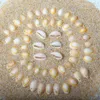 Vit naturlig spiralskal pärlor med hål ovala cowrie snäckskal tillbehör charms för diy hantverk gör halsband armband örhängen smycken