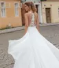 Attractive A Line Beaded Beach Wedding Dresses Halter Neck Appliqued Side Split Bridal Gowns Sweep Train Chiffon robe de mariée