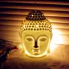 Testa di Buddha tailandese Bruciatore di olio essenziale Lampade profumate in ceramica Diffusore di aromi Portacandele Ornamento Zen Aromaterapia per la casa Nero Bianco