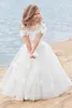 Belles robes de bal robes de fleurs robes de filles pour la plage manches courtes à manches courtes 3D appliques floral dentelle Première sainte communion robes de pageant robes