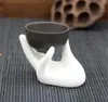 Hot Housekeeping Home Hand Shape Soporte de huevo de cerámica para el desayuno Ocarina Collector fotografía soporte de exhibición decoración del hogar soporte de taza de té KD1