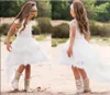 2020 Sıcak Beyaz Bohemian Çiçek Kız Elbise Mücevher Boyun Dantel Çocuk Giyim Katmanlı Etekler Backless Aplike Kız Yarışması Abiye