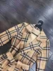 Roupas femininas européias e americanas inverno novo estilo Manga comprida lapela xadrez rosto brilhante moda trench coat