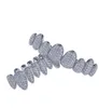 14-karatowe złoto CZ Vampire Teeth Grillz Iced Out Micro Pave Cubic Zircon 8 zębów Hip Hop Grill Top Bottom Grillz Zestaw zębów z silikonową listwą formującą