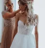 ビーチのウェディングドレス2020背中のレースのアップリケ真珠のスパゲッティストラップAラインBoho Bridal Gowns Robe de Mariee安い