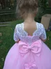 Beauté 2019 robes de fille de fleur manches courtes dentelle appliques arc petite fille robes de mariée pas cher enfant pageant robes de communion