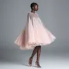 Prachtige lovertjes prom dresses pure juweel nek een lijn korte avondjurken bedekte knoppen knielengte tule geplooide formele jurk