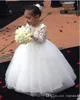 Neue günstige schöne Blumenmädchenkleider Ballkleid Juwel Langarm bodenlangen Festzugskleider für Mädchen mit Spitzentüll für die Hochzeit