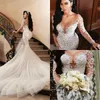 Abiti da sposa arabi lussuosi sexy con ricami a sirena con perline Abiti da sposa con maniche lunghe con collo trasparente Vestido De Novia