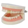 Grillz de dents en or Zircon glacé, grilles supérieures et inférieures Micro pavées, capuchons à dents simples, bijoux de dents de Vampire 1107631