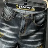 Mode-New Mew streetwear Ripped broderie Slim Skinny jeans hommes Moto Hip hop Destroyed Holes biker jeans homme Denim Pantalon