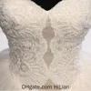 Robe de mariée de la robe de boule de luxe blanc d'ivoire blanche bretelles d'élégante robe de mariée de la dentelle symétrique élégante