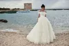 2020 Bohemian Bridal Dresses Off Shoulder Appliqued Sleeveless Wedding Dress Open Back Cascading Ruffles Sweep Train Tiers Robes De Mariée