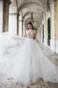 2020 Abiti da sposa Boho Collo alto Maniche ad aletta Pizzo Tulle Abiti da sposa Con gonna a volant Abito da sposa principessa spiaggia Custom8239951