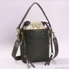 2022 Deporte al aire libre Vintage Cuero genuino Mujeres Bolsas de cubo Diseño simple Samll Bolso Cordón Tote Hombro Crossbody Drew C2282