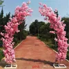 2.5M 높이의 인공 벚꽃 아치 문 도로 문 파티 백 드롭 공급을위한 인공 꽃 세트 아치 선반 모양의 납