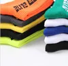 Letter fluorescent left and right foot towel bottom fission trend sports socks non-slip tide socks