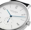 腕時計額見て男性と女性のミニマリストのデザインレザーストラップファッションシンプルな石英の防水時計1
