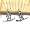 Partihandel Parti 100pcs Ski Kids Antika Silver Charms Pendants Smycken Resultat DIY för halsband Armband 23 * 26mm DH0810