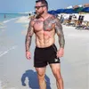 Nowa siłownia Crossfit Sports Sports Mężczyźni Szybki Suchy Running Shorts Mens Siłownia Training Bodybuilding Krótkie spodnie Sportswear Beach Sports