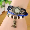 Dameshorloge Meisje Retro Lederen Winding Armband Owl Hanger Touw Weave Animal Tag Dameslegering Polshorloge