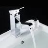 Robinet de salle de bains chromé blanc de luxe monté sur le pont en laiton chaud et froid lavabo de cuisine robinet d'évier à levier unique un trou