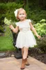 2020 reizende Blumen-Mädchen-Kleider Appliques 3D-Blumen-Mädchen-Festzug-Kleider Juwel kurz Mädchen-Partei-Kleider