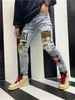 2020 Slim Straight Jeans Men Tore Tore Denim Torn Jeans Club de nuit Black Blue Coton Fashion Terre Spring et automne Men039S PANTAL H35377284