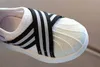 Hot Selling 2 Colors Black White Baby Shoes Toddler Baby Boys Girls Breathable Soft Bottom Infant Canvas Shoes First Walkers