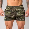 Novo Ginásio Crossfit Sports Shorts Men Rápido Corrida Corrida Calções Mens Ginásio Treinamento Bodybuilding Calças curtas Sportswear Beach Shorts