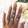 BOHEMIAN 12PCS One Set Band Nail Ring Sets Vattendroppe Sol Sexpekad Star Crown Opal Creative Designer Smycken för Kvinnor Ring Tillbehör