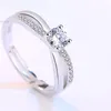 Cross Cubic Zirconia Ring Solitaire Crystal Open Justerbara engagemang Bröllopsringar för kvinnor Fashion Jewelry Will och Sandy Drop Ship 080471
