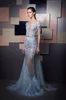 Luxury Evening Dresses Lace Appliques Beads Feather Mermaid Prom Party Gowns Short Sleeve Detachable Train Special Occasion Gowns