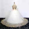 Elegante collo alto in pizzo con una linea di abiti da ragazza di fiori Tulle Applique in pizzo dorato Lunghezza del pavimento Abiti da festa di compleanno per ragazze219W