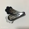 Regalo per feste moda fiore acrilico bianco e nero forcina C clip laterali per capelli per gli articoli delicati preferiti dalle donne, accessori per gioielli copricapo