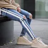 Calças de brim masculinas europeias americanas moda de rua luz azul branco listra hip hop calças jeans skinny homens destruídos rasgados homme