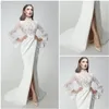 Prom Klänningar Nya 2020 Lace Appliqued Långärmade Sidor Split Mermaid Evening Gowns Sweep Train Special Occasion Dress Party Dress