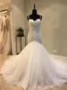 Suknie ślubne w stylu vintage syrenka z ramiączkami spaghetti koronkowe aplikacje i tiulowe suknie ślubne bez pleców pociąg kaplica dostosowane suknie ślubne