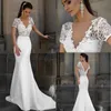 Abiti da sposa a sirena bohémien 2020 in pizzo con scollo a V a maniche corte sul pavimento Abiti da sposa lunghi eleganti country Boho beach Abiti da sposa