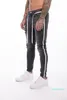 Горячие продажи - роскошные мужские джинсы мода дыра промытые карандаш брюки дизайнер отвлекают тонкие джинсы несколько стилей