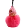 Nya söta sovande baby dollnyckelringar för kvinnor väska leksak nyckelring fluffig pom pom faux päls plysch nyckelringar