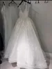 Novo vestido de esferas de lantejoulas sexy Bling Vestidos de bola de pescoço profundo vestilos de casamento de pescoço