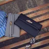 Factory grossist märke kvinnor handväska joker läder långa plånböcker mode spänne koppling väska elegant bälte dekorerade kvinnors plånbok