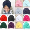 New Europe Fashion Infant Baby Hat Kids Kink Knot Caps Solid Color Biggin Girls Children Skull Cap Hats A628