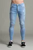 Jeans effetto consumato da uomo Jeans skinny con fori strappati Pantaloni hip-hop slim fit in denim elastico Pantaloni a matita elasticizzati maschili Streetwear