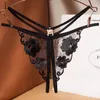 女性のセクシーなパンティー下着濃いG弦卸売の女の子ビキニホットスーラー透明の透明性のある刺繍包帯女性のセックス