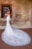 2020 Abito da sposa a sirena senza spalline sexy Abito da sposa in pizzo senza maniche con applicazioni floreali Abito da sposa senza schienale con volant Corte dei treni Robes De Mari￩e