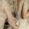 Sexy Champagne New Wedding Dresses A Line Jewel Neck Long Sleeves Lace Illusion Crystal Beads Chapel Train Plus Size Formal Bridal Gowns