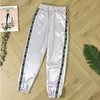 Pantaloni da donna con nastro sportivo Pantaloni comodi di nuova moda con grandi tasche per le donne Spedizione gratuita